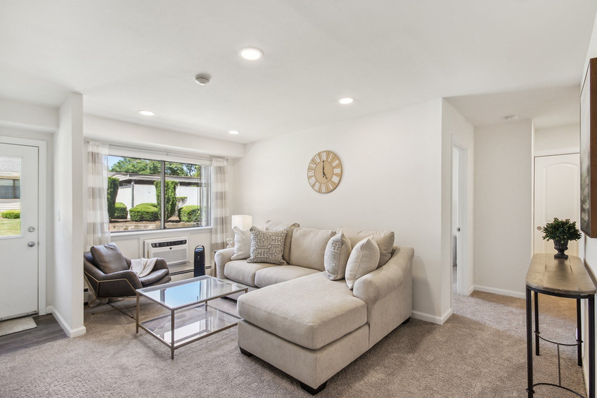 a living room with a couch and a coffee table