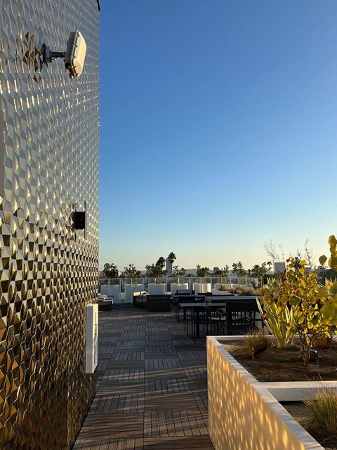 a view of the rooftop terrace of the building