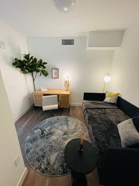 a living room with a couch and a table