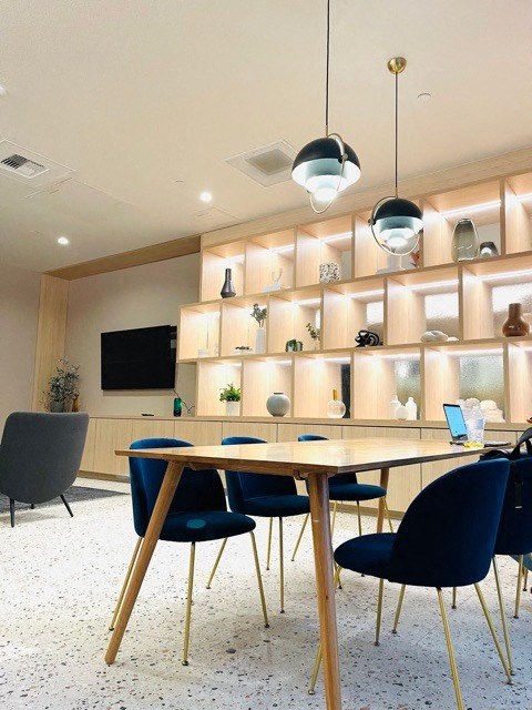 a dining room with a table and chairs