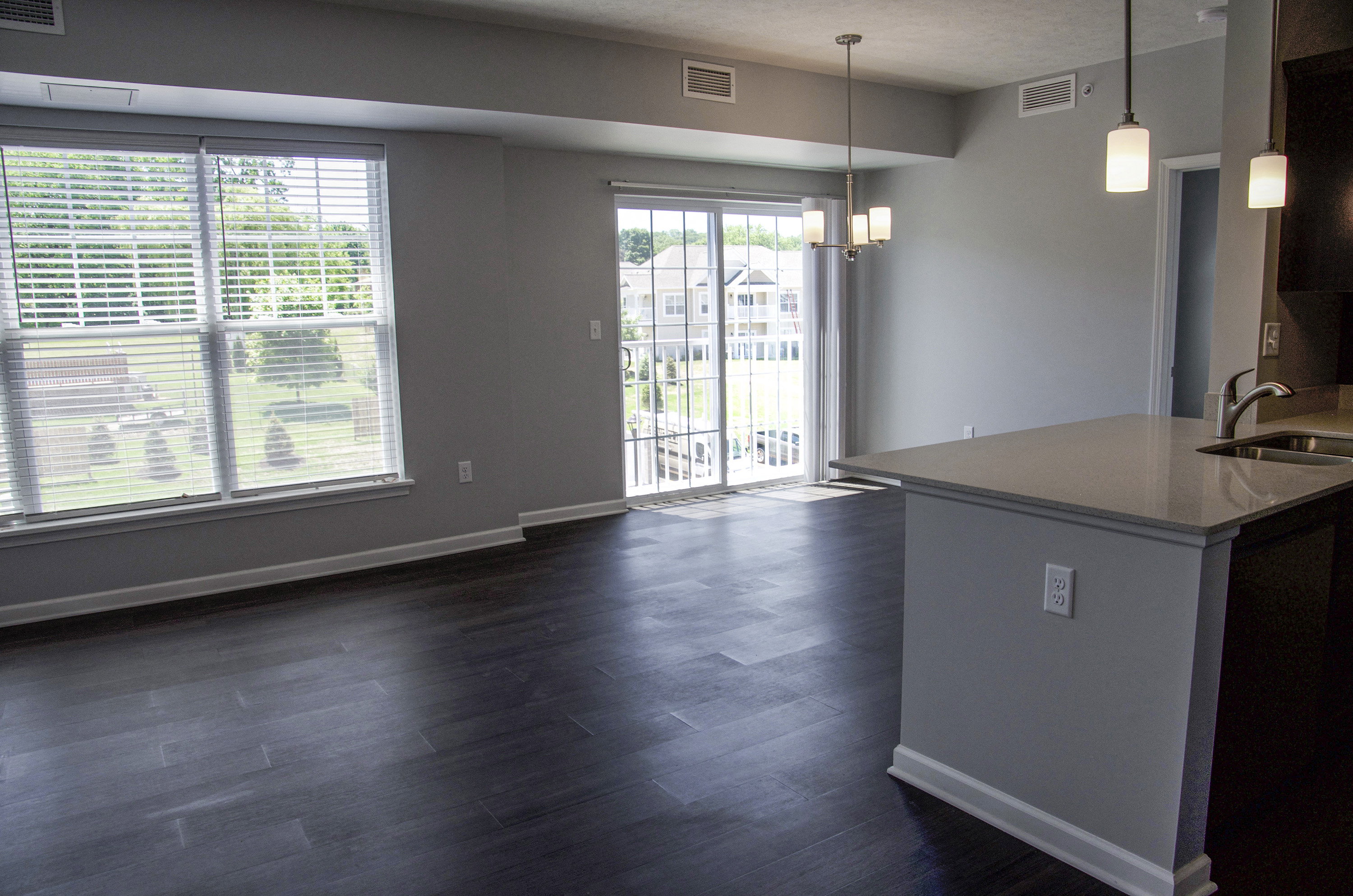 A kitchen area with a counter and a window.