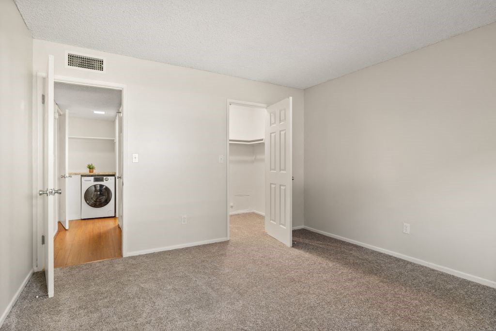 Primary Bedroom with Closet at Lombardi Apartments, California