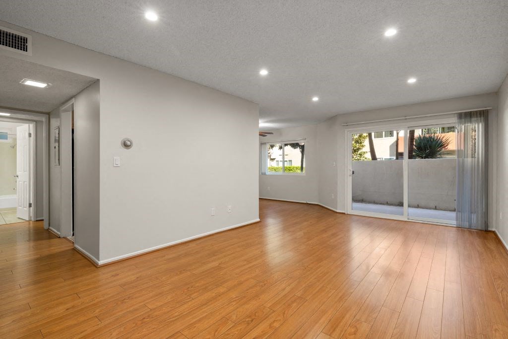 a living room with a hard wood floor  at Lombardi Apartments, Woodland Hills, CA, 91367