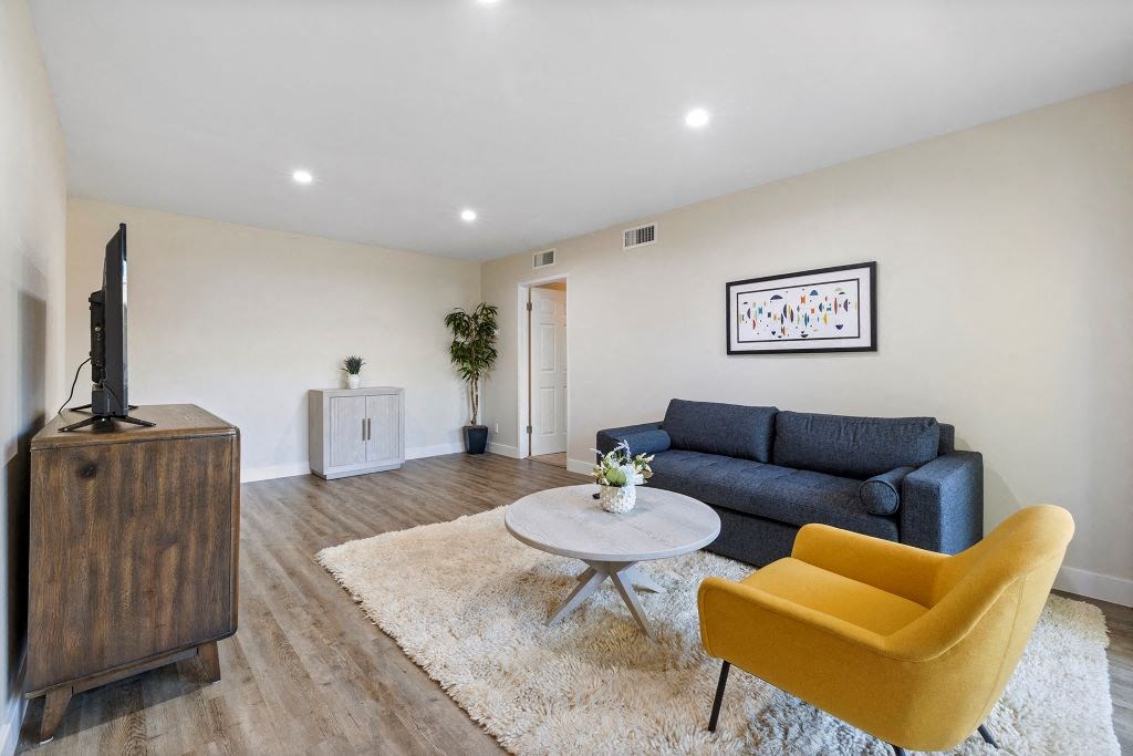 Living Room With TV at Lombardi Apartments, California, 91367