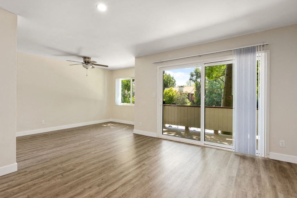 Living Room with Sliding Glass Doors at Lombardi Apartments, Woodland Hills, California