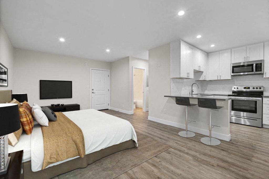 Virtually Staged Studio Living Area and Kitchen at Brookside Terrace Apartments, Encino, CA 91316
