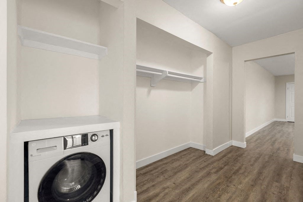 a laundry room with a washer and dryer