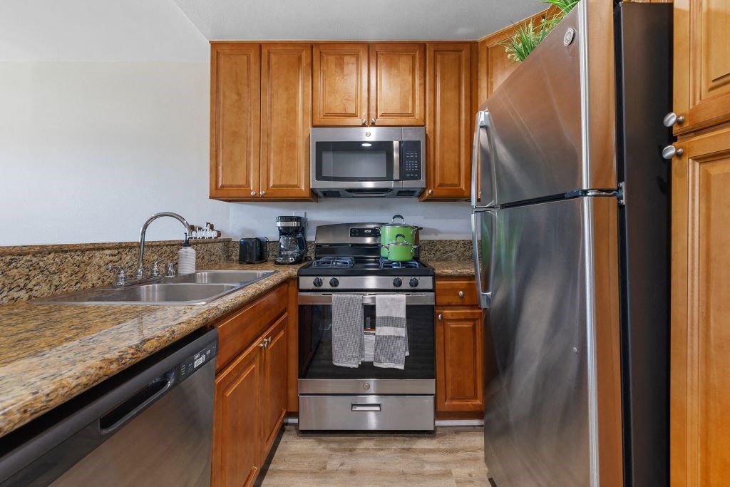 Kitchen at Woodland Trio Apartments, North Hollywood, 91601