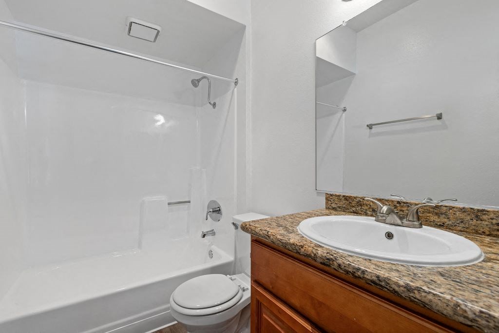 Bathroom With Bathtub at Woodland Trio Apartments, California