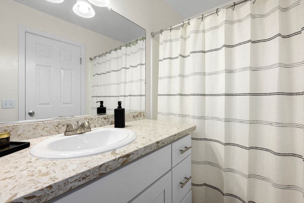 Bathroom along with curtain at The Meadows at Westlake Village Apartments,California, 91361