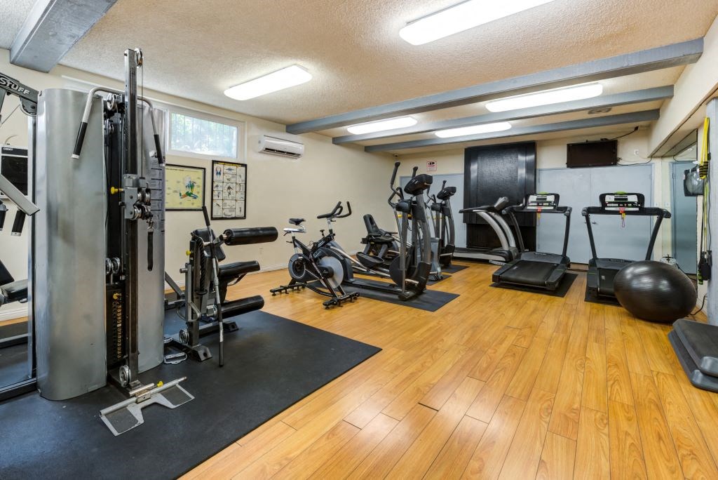 Spacious Fitness Center Featuring Various Cardio and Weight Equipment at Casa De Marina Apartments, Los Angeles, CA