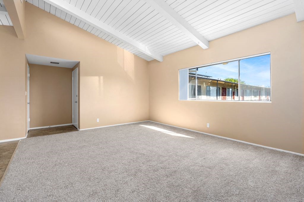 Carpeted Living Room at St. Andrews Apartmens