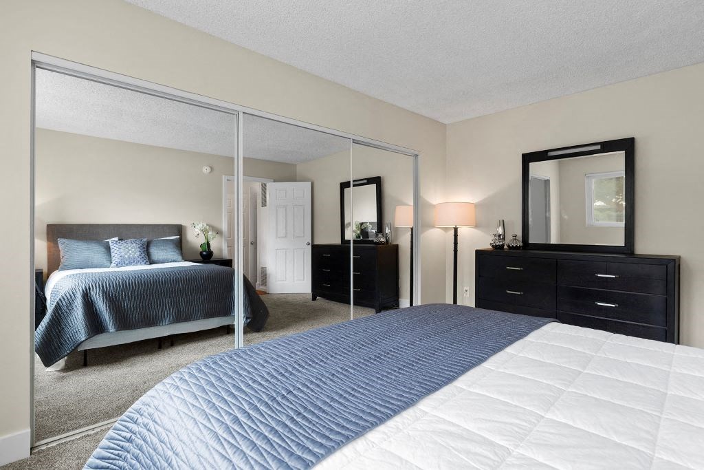 Bedroom with Mirrored Closet Doors at Casa De Marina Apartments, Los Angeles