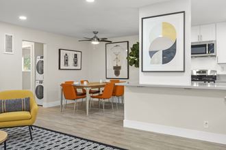 Valley Village Apartments - Kling Trio - Living Room With Modern Furniture and Dining Room Table