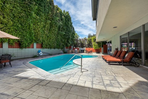 Pool and Seating chairs at White Oak Terrace Apartments, Encino, 91316