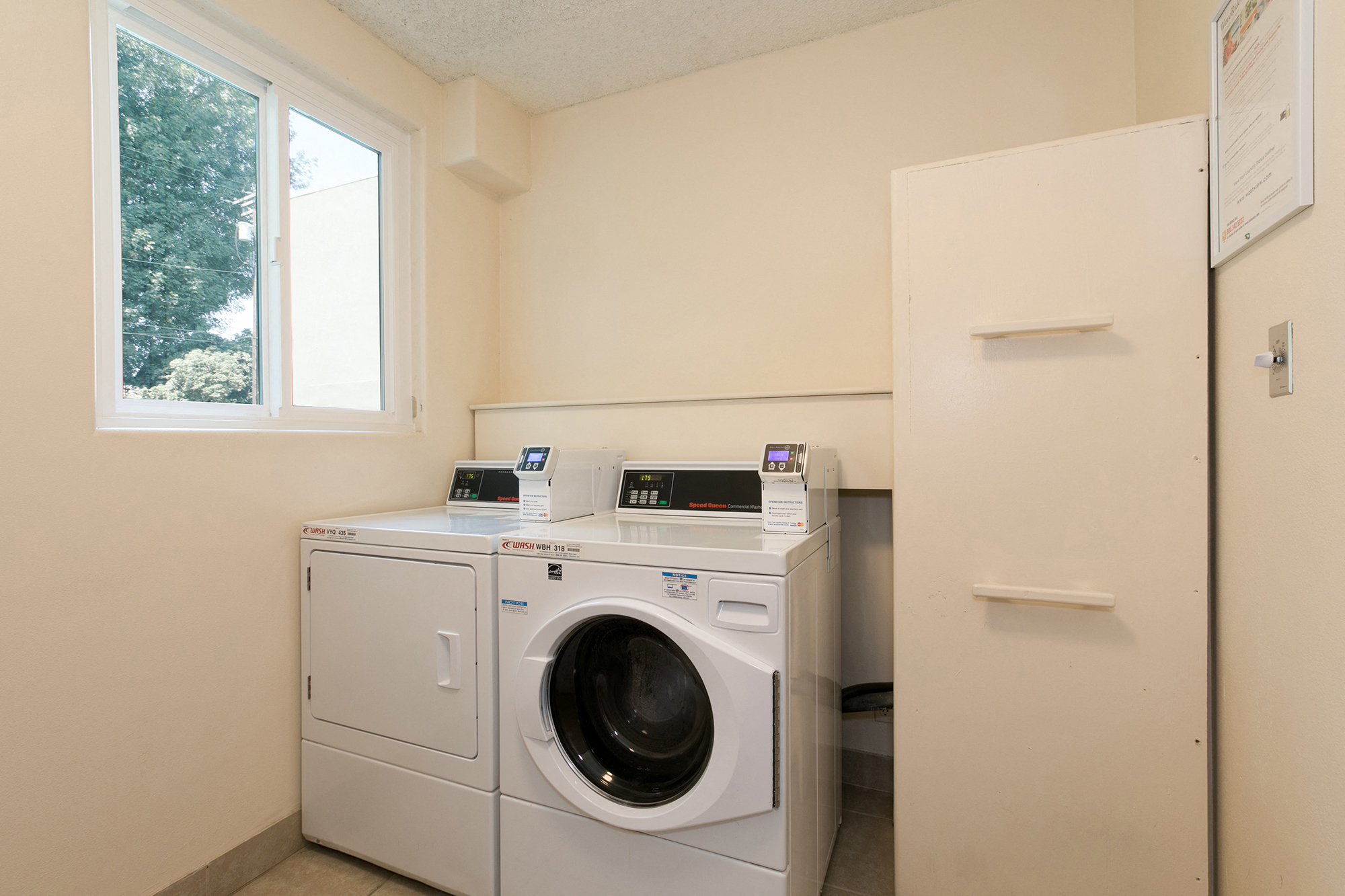 Apartments in Sherman Oaks for Rent- Laundry Room at Krystal Terrace Featuring Washer and Dryer
