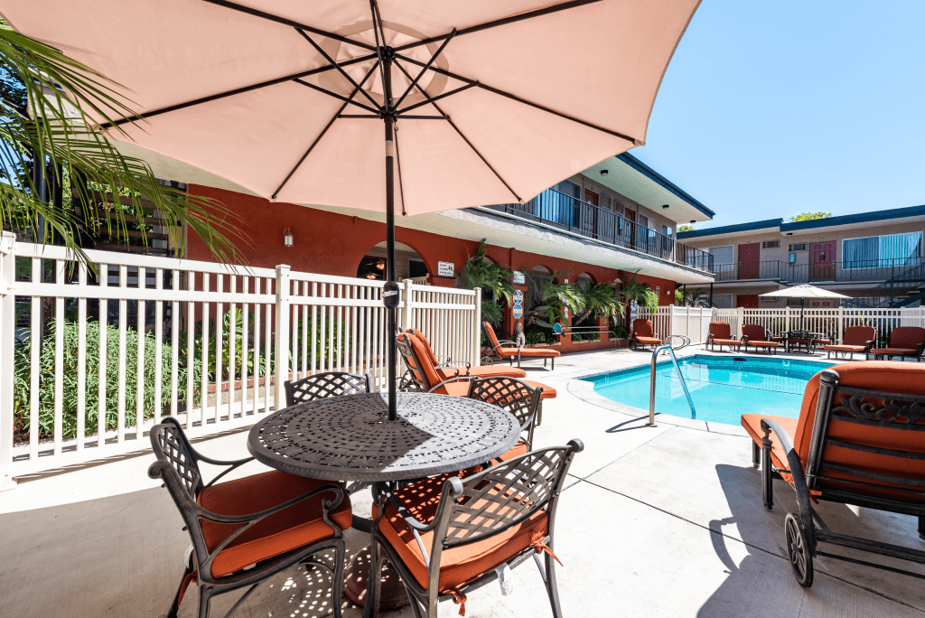 Pool Area With Beautiful Landscaping And Lounge Chairs at Parkview Terrace Apartments, Sherman Oaks
