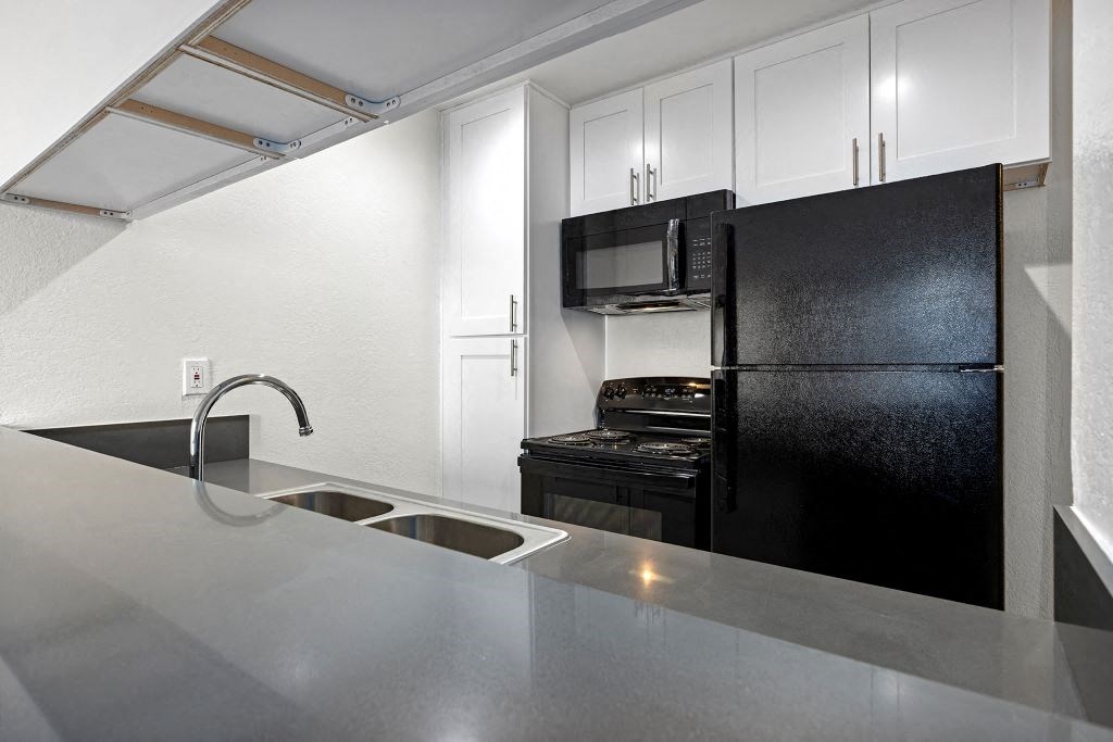 Kitchen with Updated Cabinets and Countertops at Topanga Canyon Apartments, West Hills, California