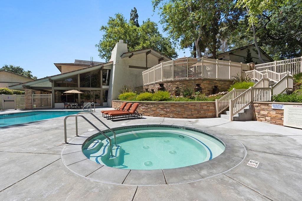 Jacuzzi Area with Lounge Chairs and Pool View at The Meadows  at The Meadows at The Meadows at Westlake Village Apartments,Westlake Village, California