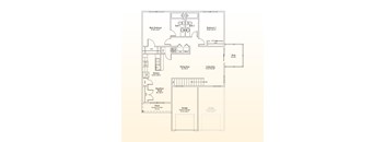 A floor plan of a house with two garages, a deck, and a living area.