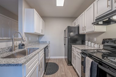 Renovated Kitchen with black appliances