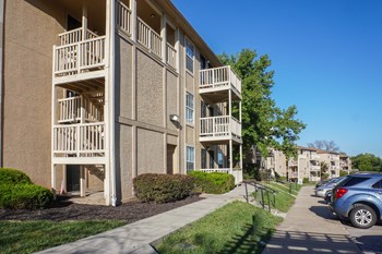 Parking in front of the building Parking in front of the building at The Life at Highland Village, Kansas City, Missouri - Photo Gallery 2