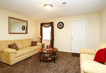 Living Room Cozy livingroom at The Life at Lakeside Villas in Wilmington, NC - Photo Gallery 3