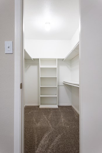 a walk in closet in a 555 waverly unit - Photo Gallery 17