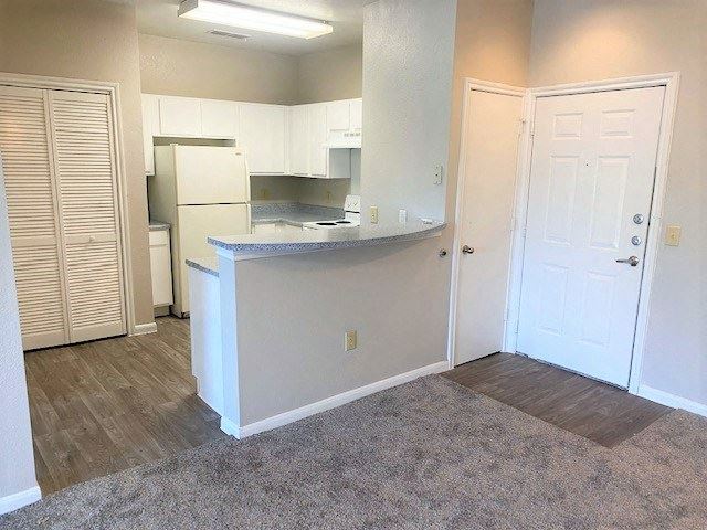 Kitchen and entry way Kitchen and entry way at The Life at Sterling Woods, Houston, TX - Photo Gallery