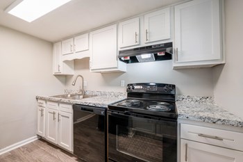 Renovated Kitchen with granite countertops Renovated Kitchen with granite countertops at The Life at Edgewater Landing, Ohio - Photo Gallery 5