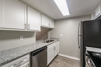 Renovated Kitchen with white shaker style cabinets