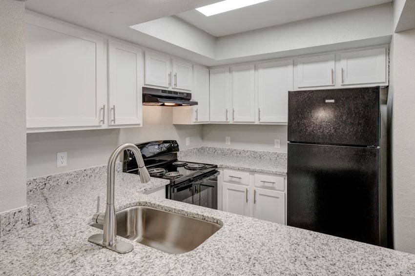 https://cdngeneral.rentcafe.com/dmslivecafe/2/107205/renovated-kitchen-web(1).jpg?width=850&quality=80