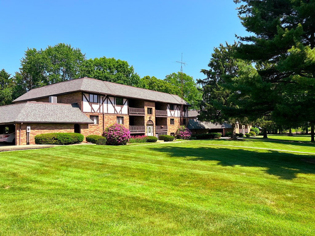 a large lawn in front of a building