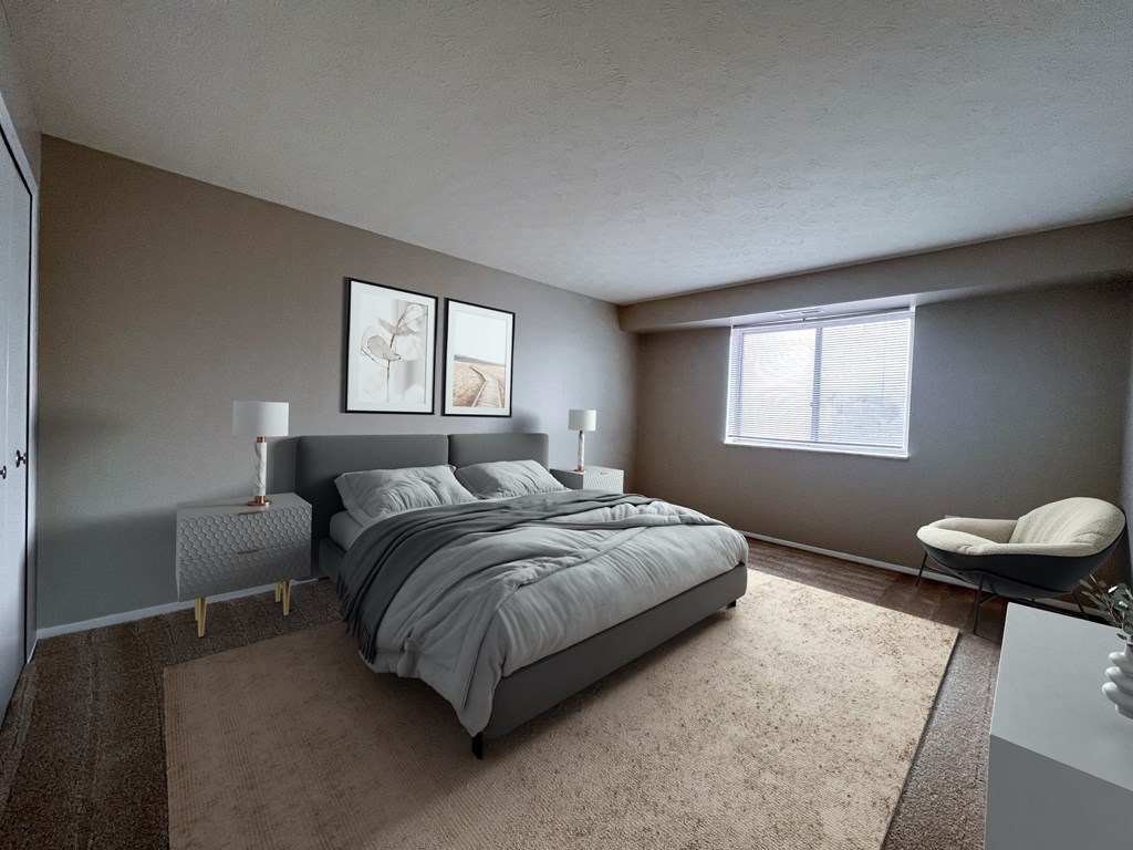 Bedroom with a bed, area rug, dresser, and chair