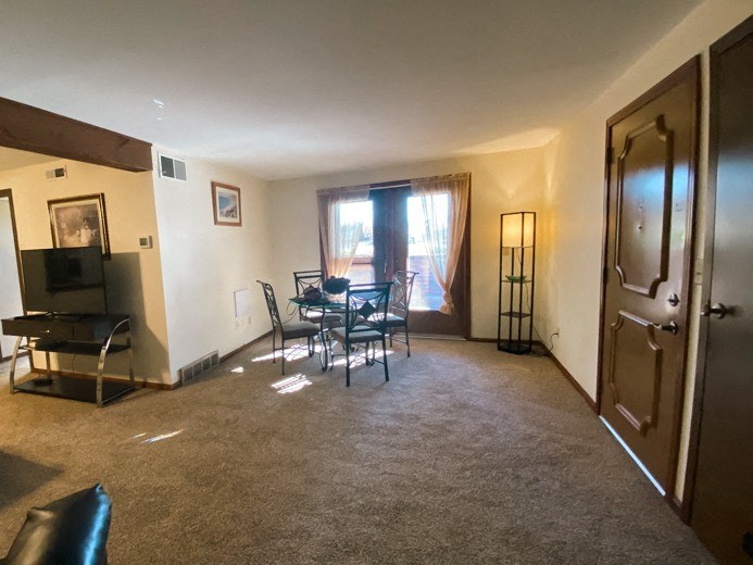 Model Living Room, View of Patio Doors