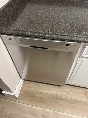 A dishwasher is installed in a kitchen.