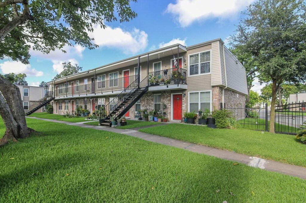 our apartments are located in a quiet neighborhood with grass