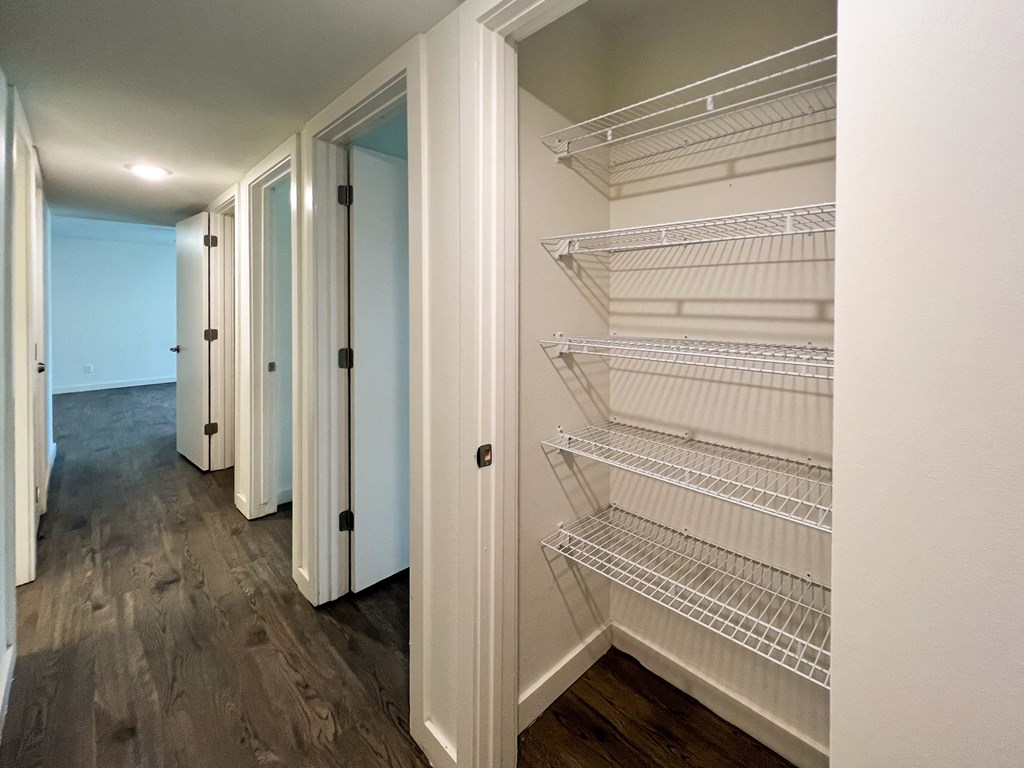 Hallway with linen closet