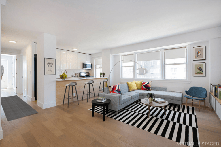 peninsula kitchen and open concept living room