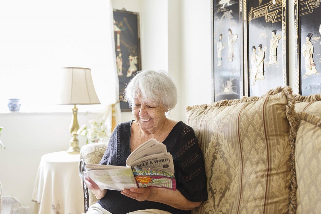 Resident reading a book
