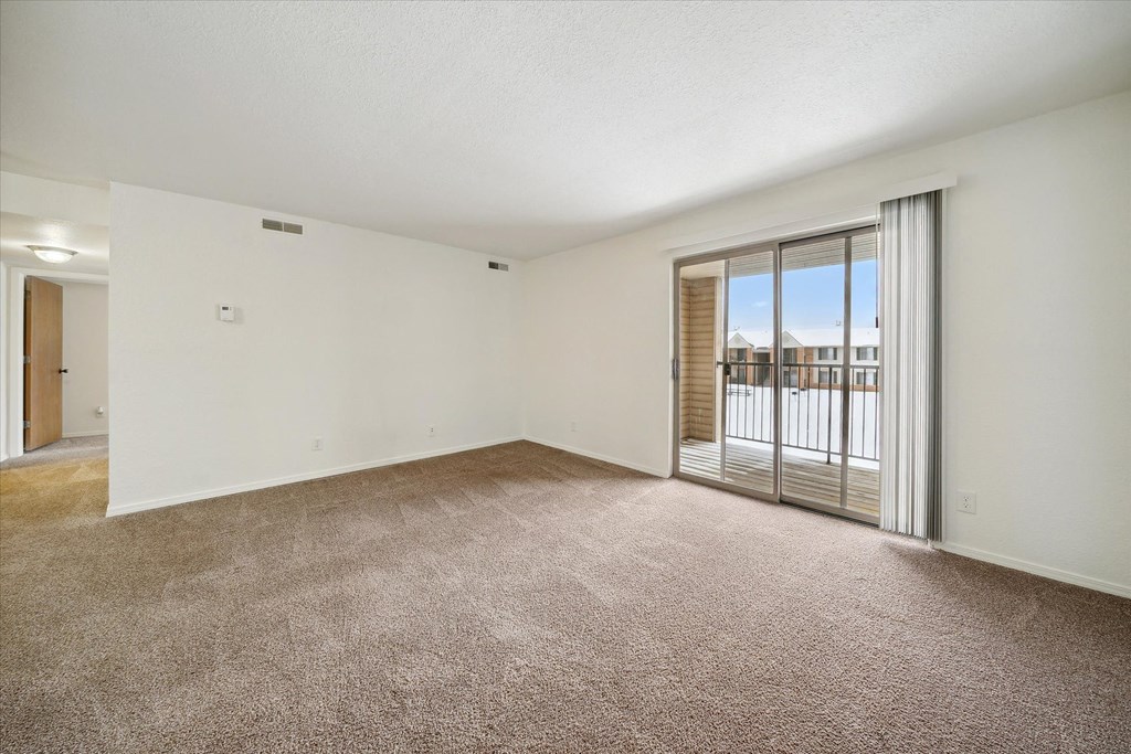 Spacious Living Area with Carpet