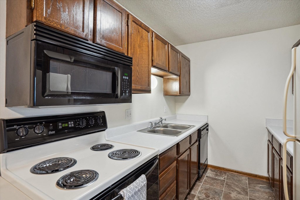 Kitchen with Brown Cabinetry