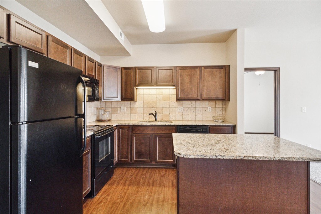 Kitchen with Dark Wood Cabinets