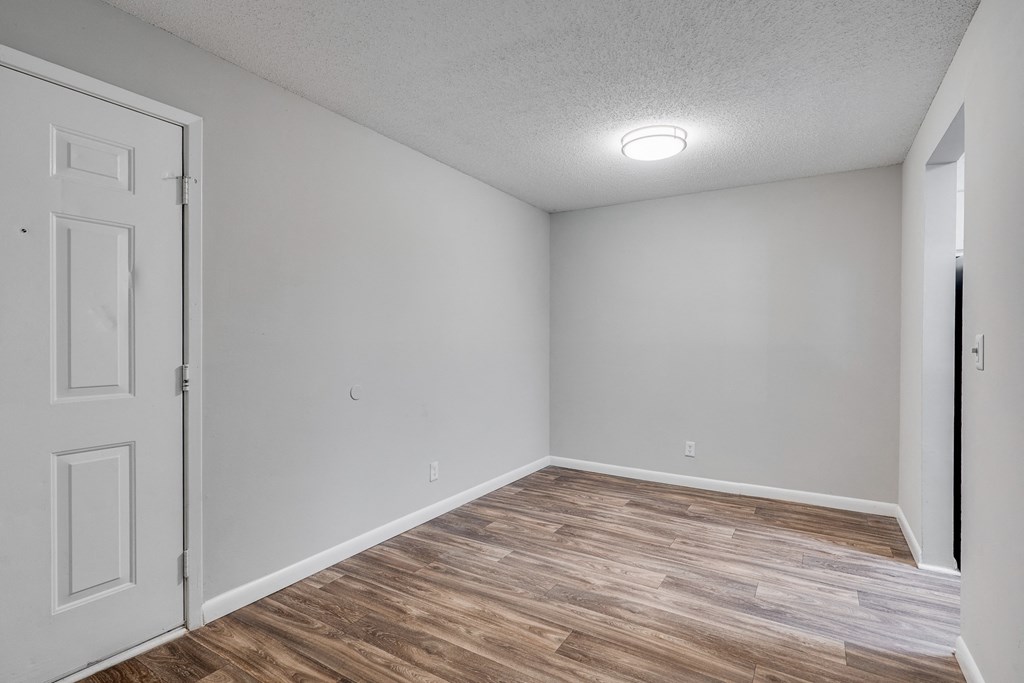 Designated Dining Room Area With Wood-Style Flooring