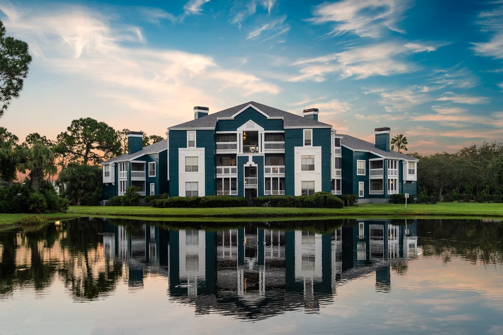 Apartment Homes Overlooking The Pond At Twilight