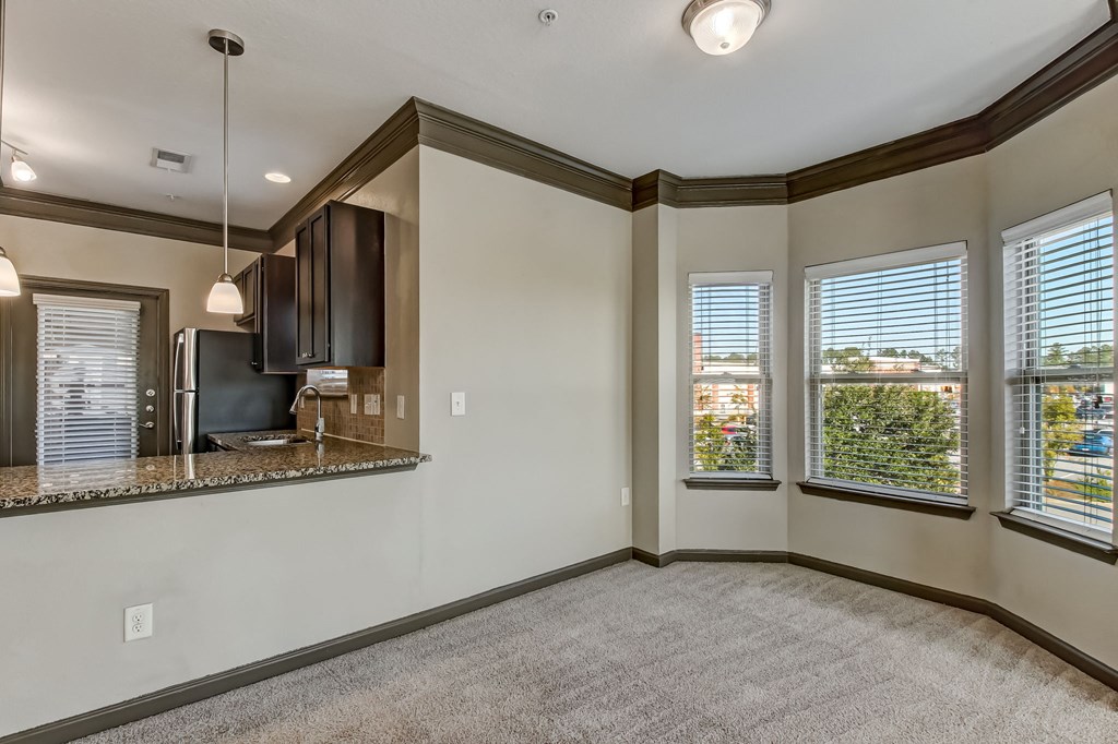Spacious Living Area with Carpet
