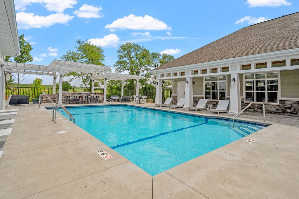 Sparkling Outdoor Pool with Expansive Sundeck