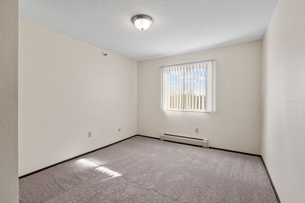 Bedroom with Overhead Lighting