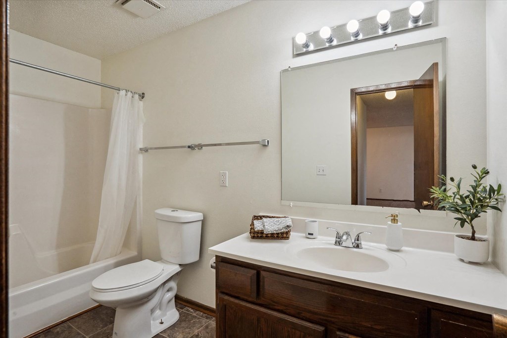 Bathroom with Brown Cabinetry