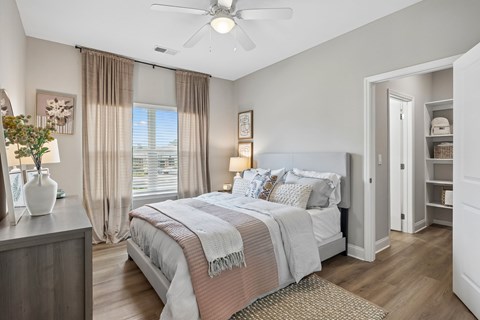 Bedroom with Wood-style flooring